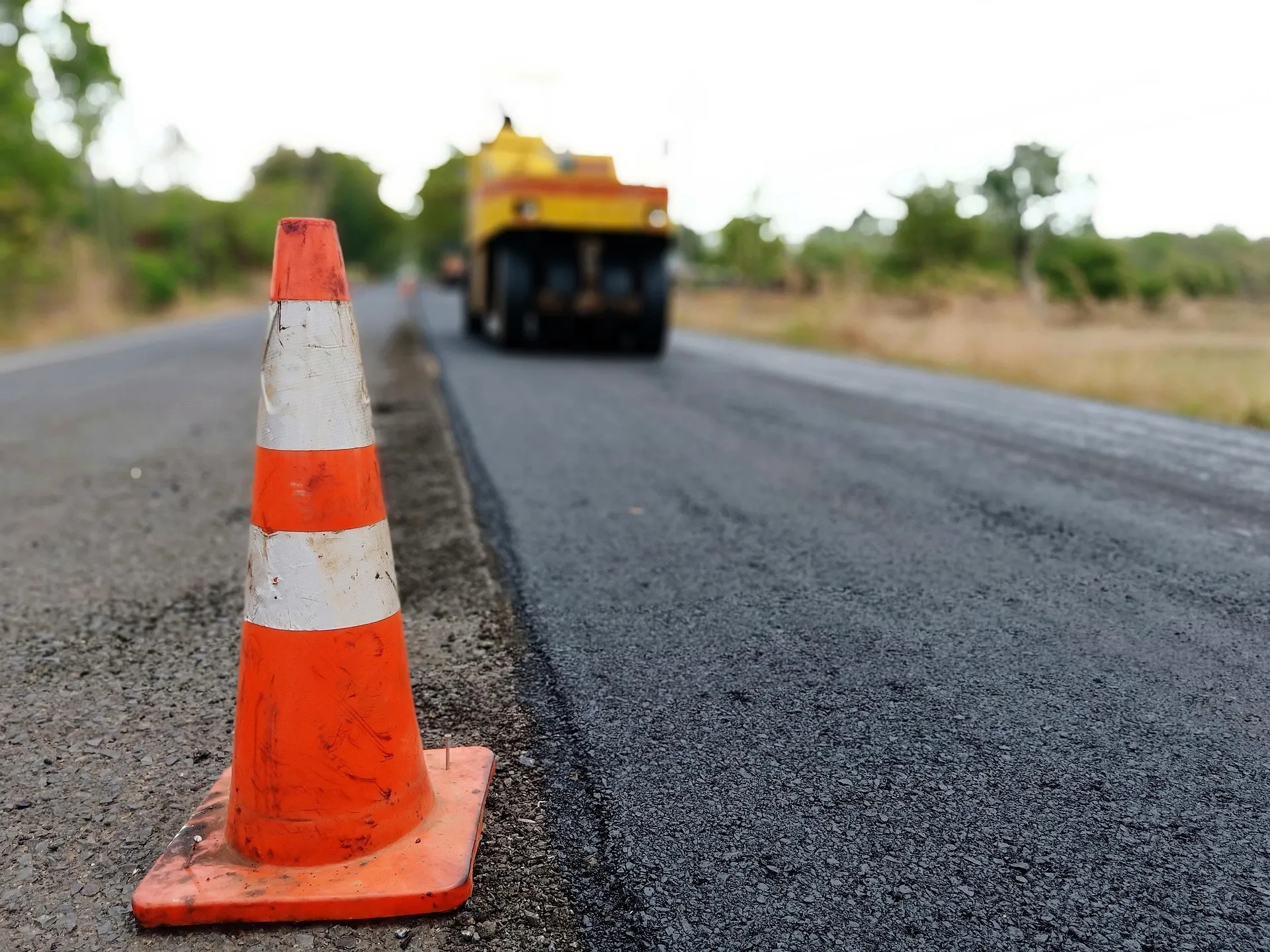 Private asphalt road with a compacted section